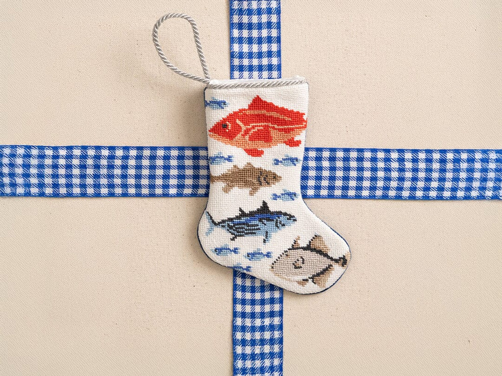 Needlepoint mini stocking with fish on it.