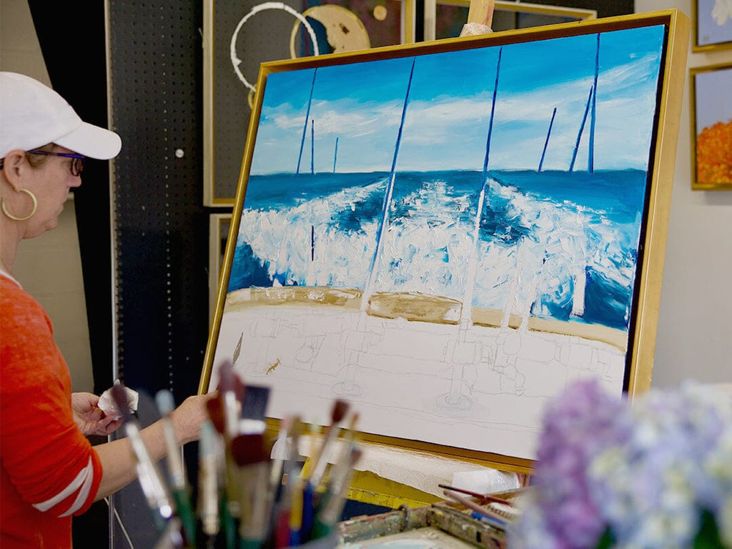 Artist painting a canvas.