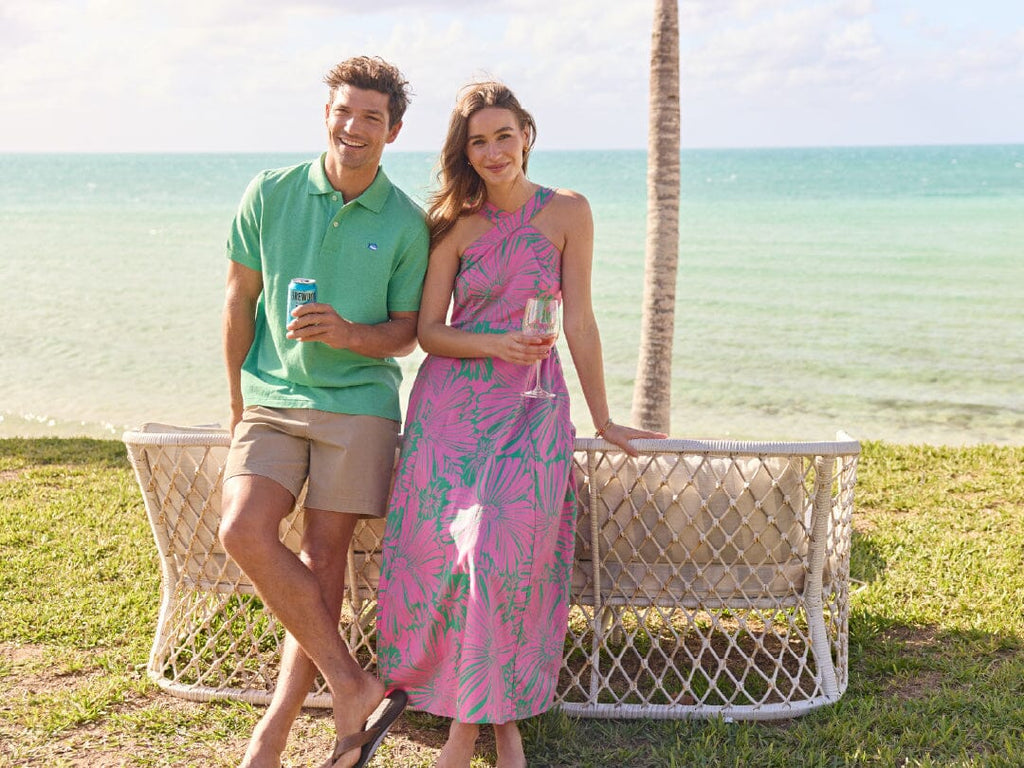 Man wearing printed short sleeve button down shirt at the beach.