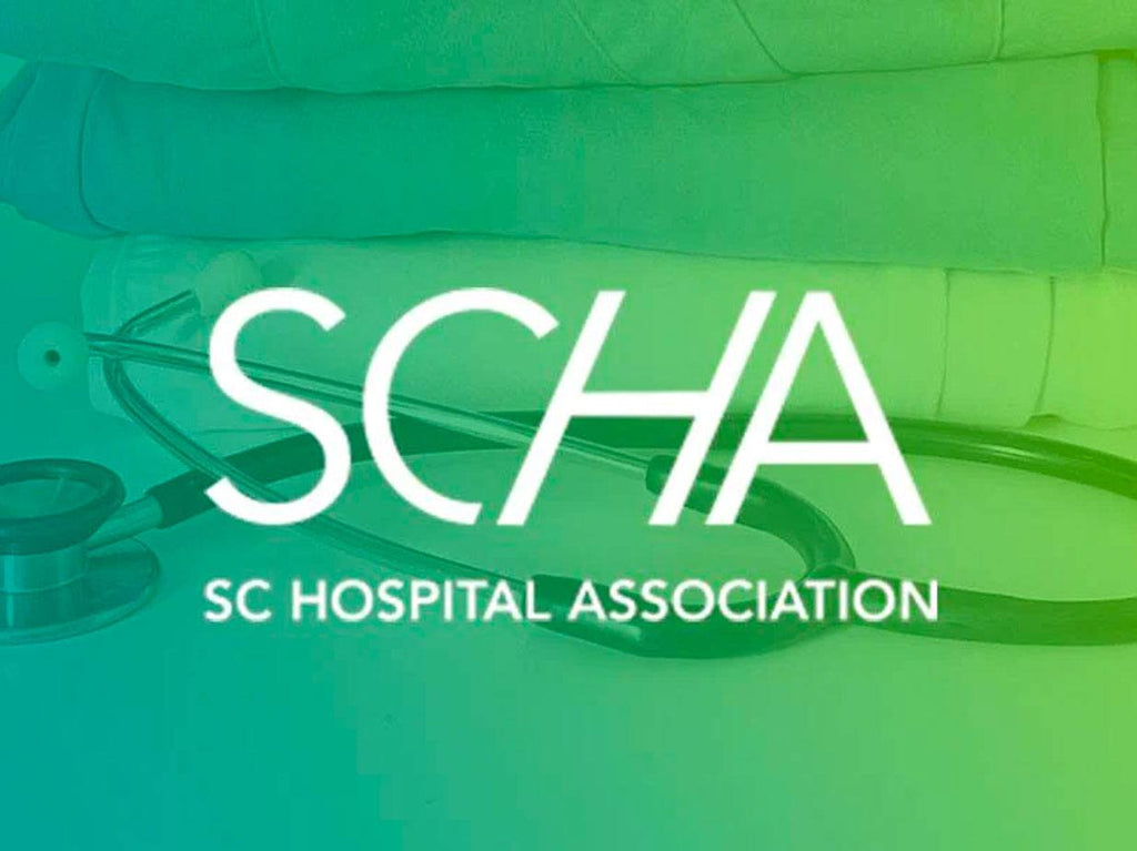 SCHA logo with faded stethoscope image in background.