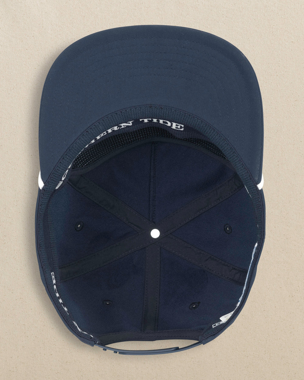 The under view of the Southern Tide 18 Holes 5 Panel Hat by Southern Tide - Navy