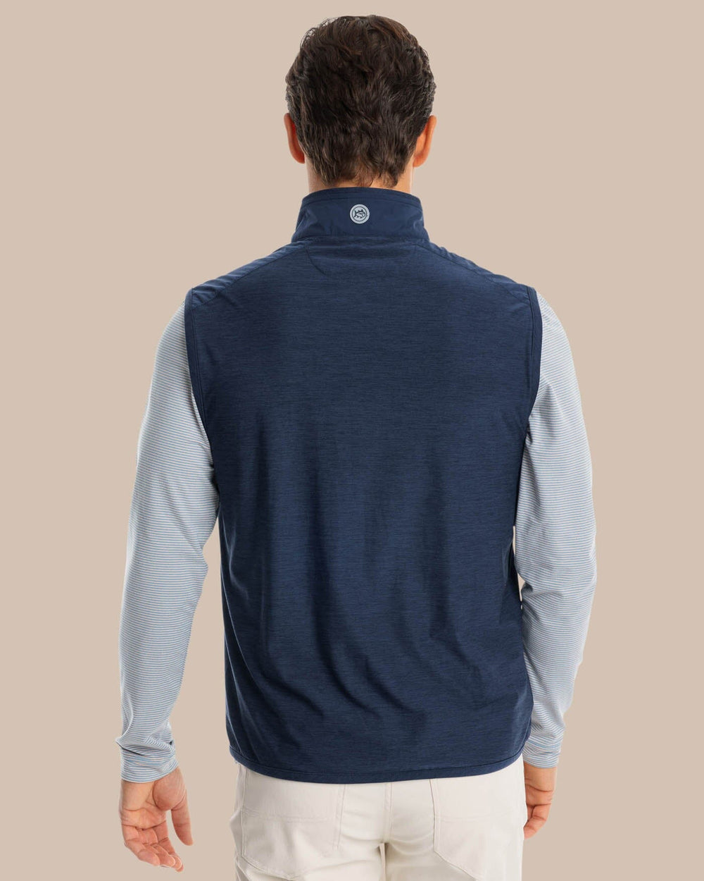 The model back view of the Men's Abercorn Performance Vest by Southern Tide - True Navy
