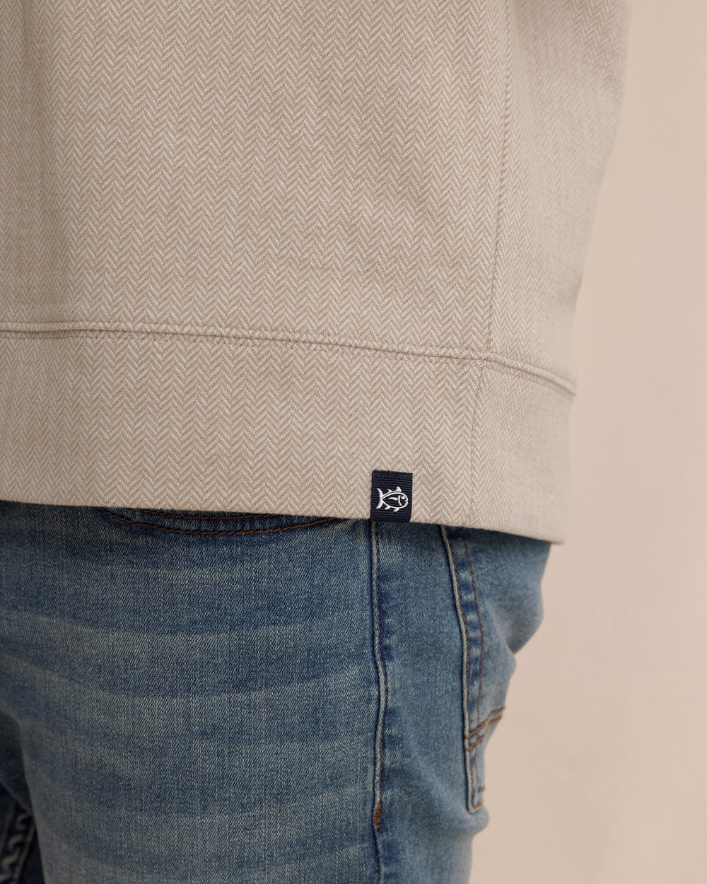 The detail view of the Southern Tide Adler Lane Quarter Zip by Southern Tide - Sandstone Khaki