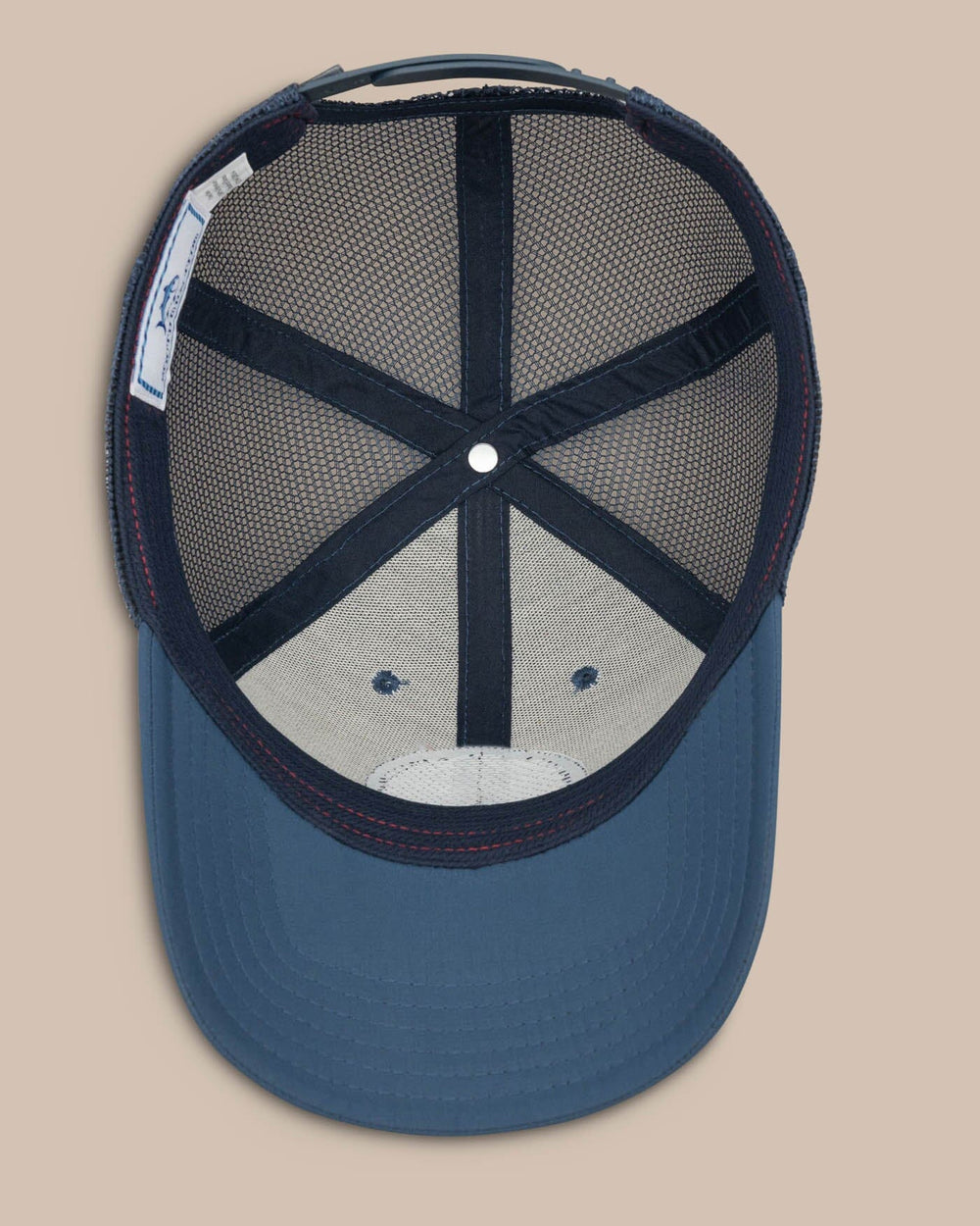 The below view of the Men's Alabama Patch Performance Trucker Hat by Southern Tide - Seven Seas Blue