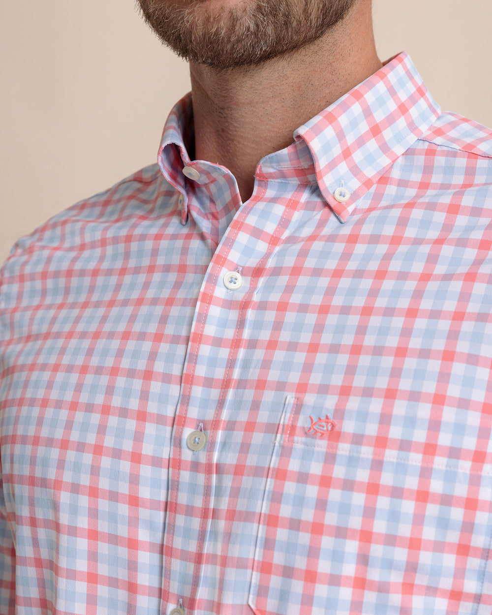 The detail view of the Southern Tide Albemarle Gingham brrr°® Intercoastal Sport Shirt by Southern Tide - Sunkist Coral