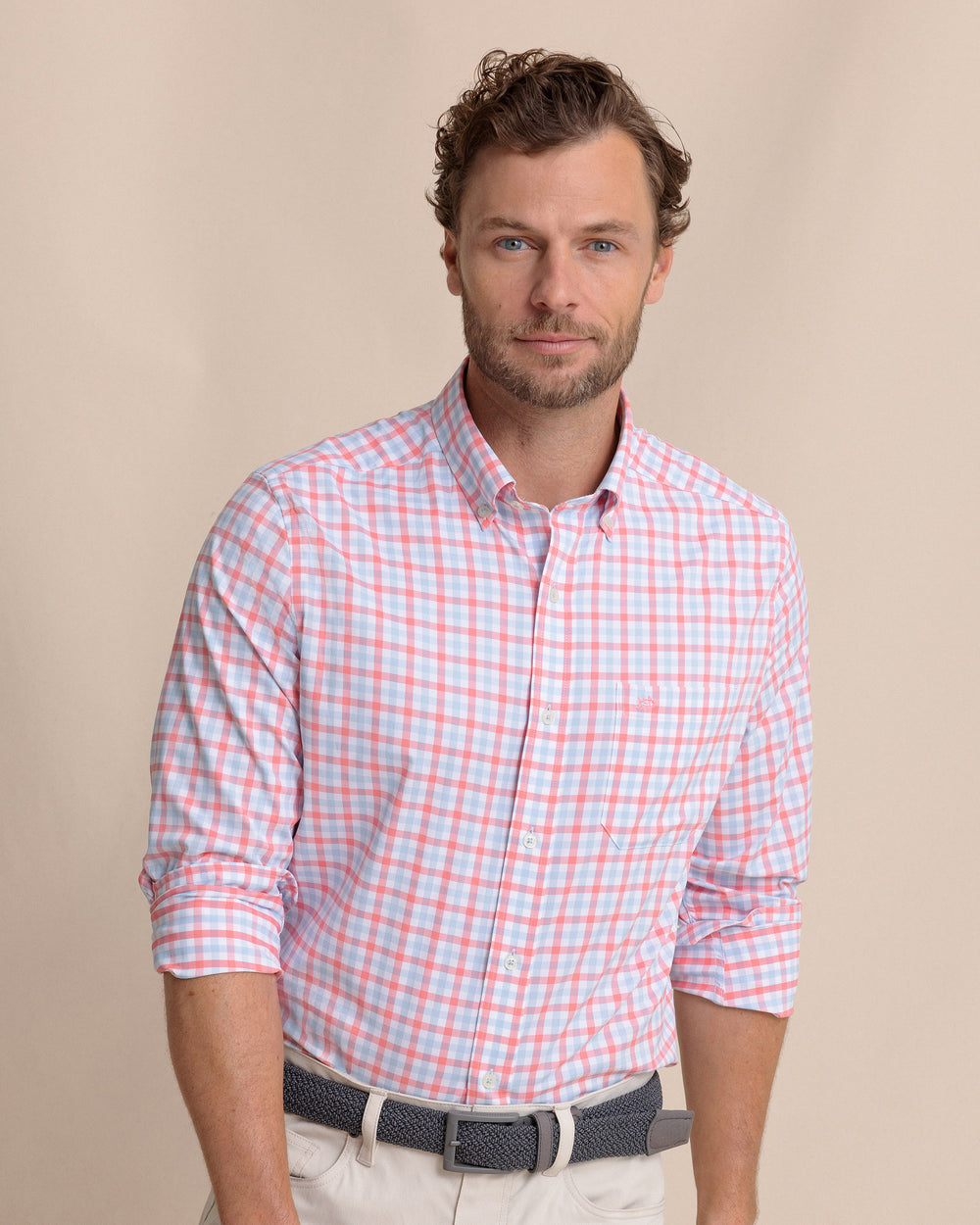 The front view of the Southern Tide Albemarle Gingham brrr°® Intercoastal Sport Shirt by Southern Tide - Sunkist Coral
