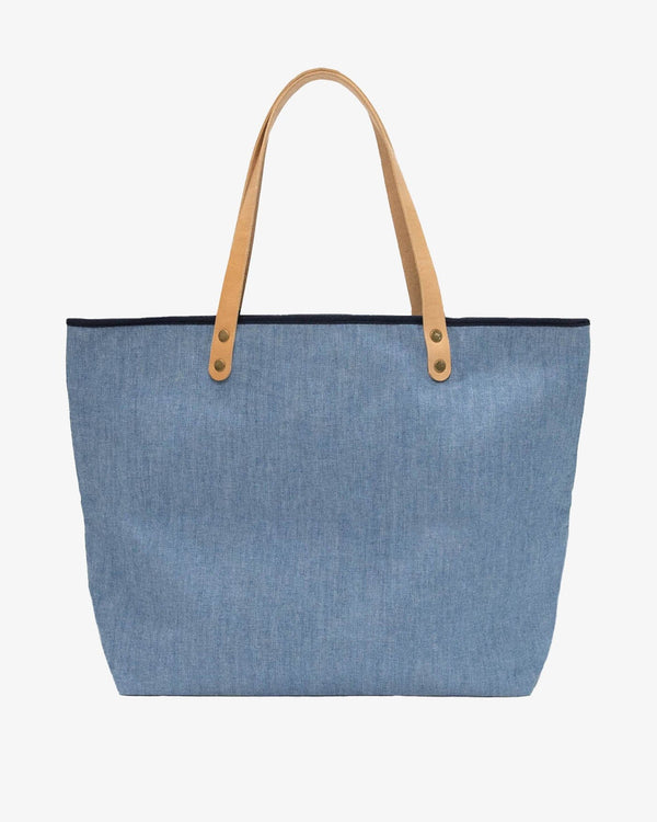 The front view of the All Day Denim Tote by Southern Tide - Navy