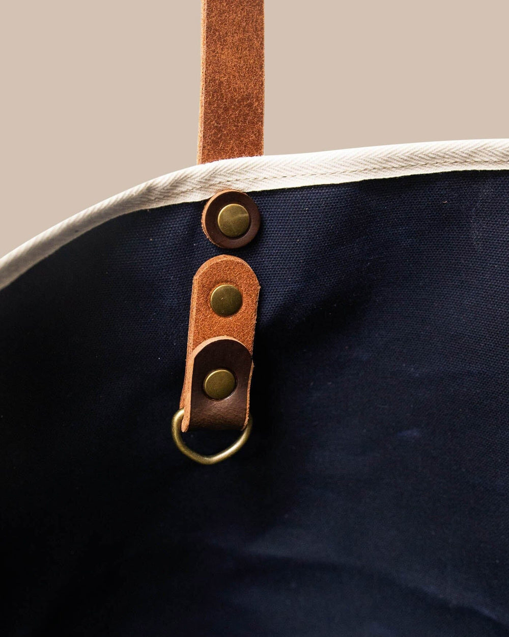 The detail view of the Southern Tide All Day Denim Tote by Southern Tide - Navy