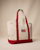 The right side view of the Southern Tide American Flag Medium Classic Tote by Southern Tide - Red
