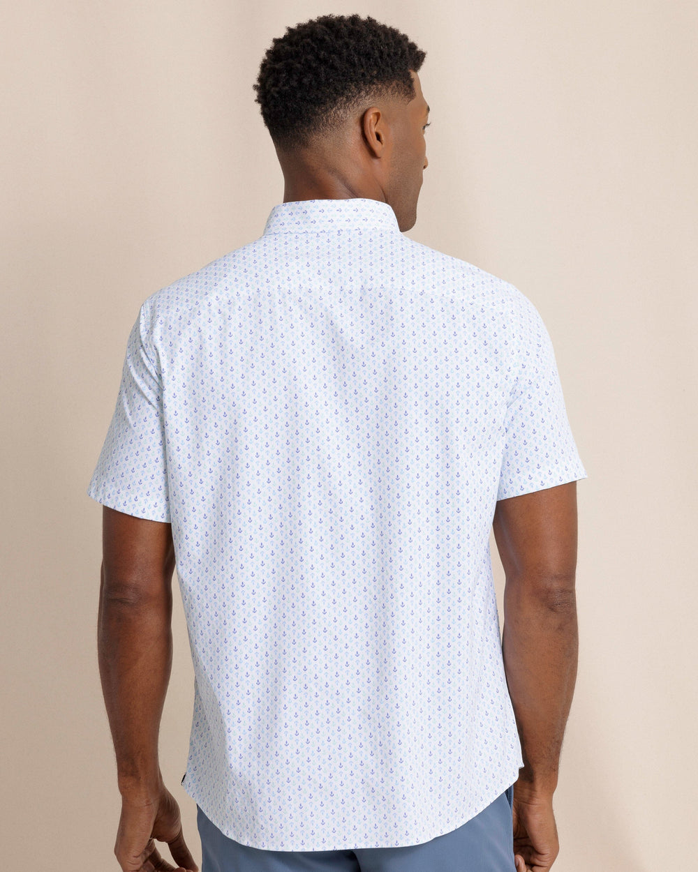 The back view of the Southern Tide Anchors Away Intercoastal Short Sleeve Sport Shirt by Southern Tide - Dazzling Blue