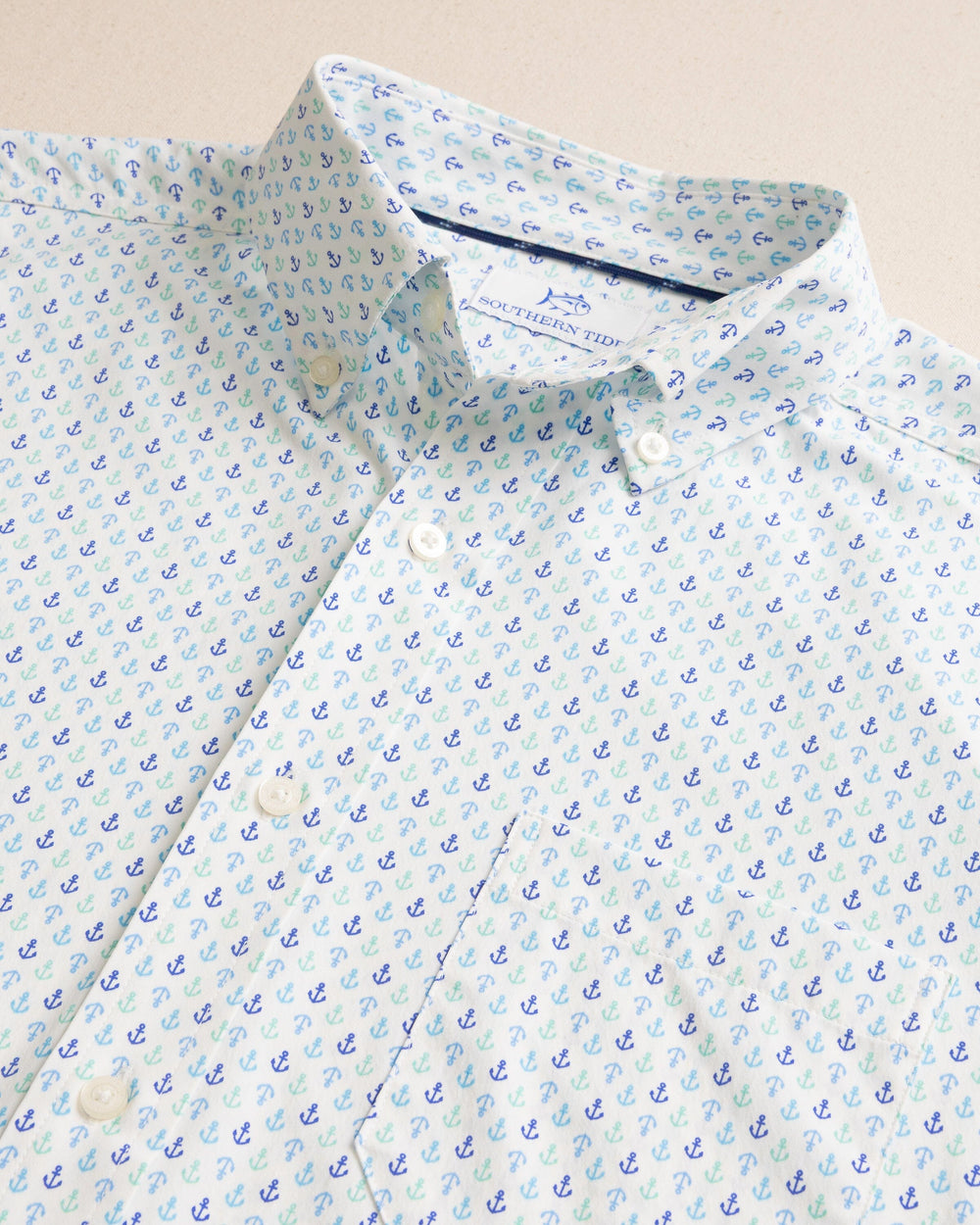 The detail view of the Southern Tide Anchors Away Intercoastal Short Sleeve Sport Shirt by Southern Tide - Dazzling Blue