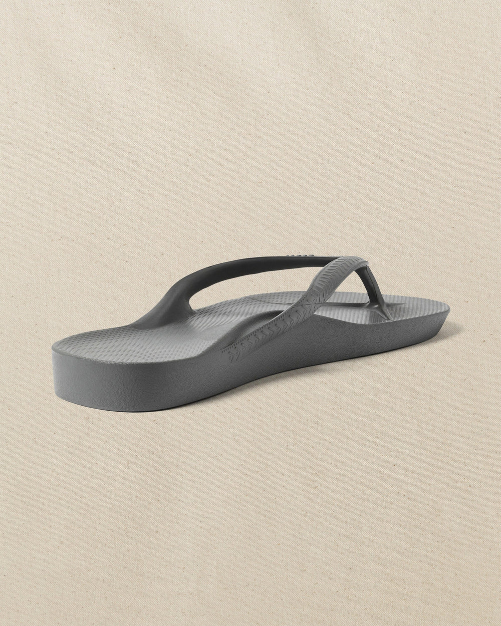 The right bottom view of the Southern Tide Archie's Charcoal Arch Support Flip Flop by Southern Tide - Charcoal