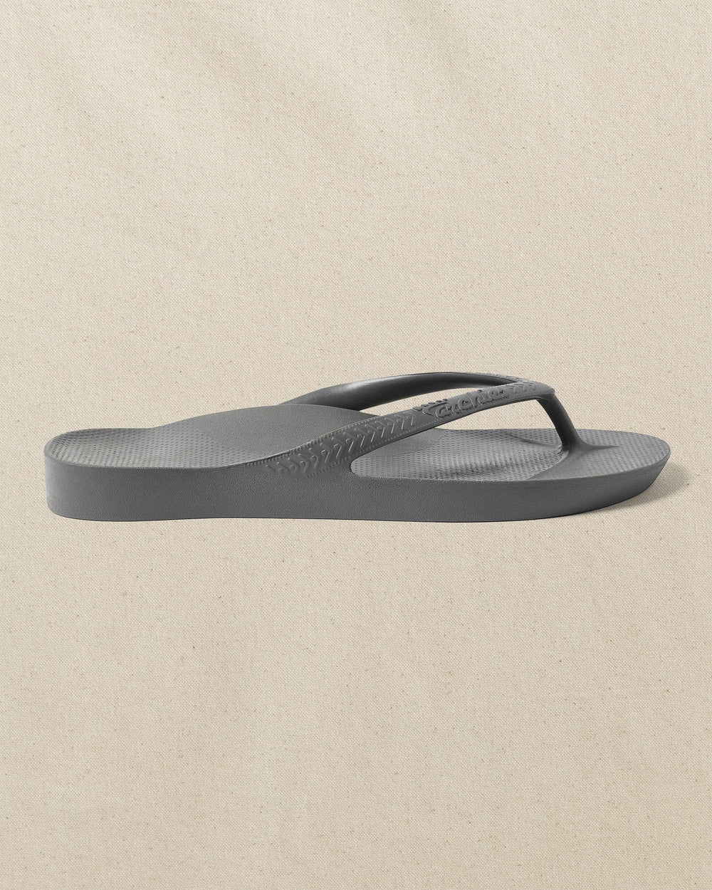 The right side view of the Southern Tide Archie's Charcoal Arch Support Flip Flop by Southern Tide - Charcoal