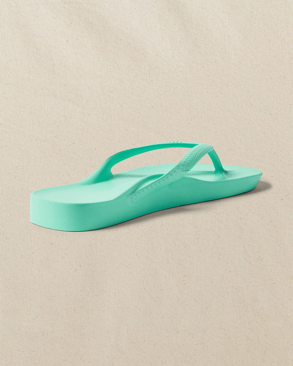 The right back view of the Southern Tide Archies Mint Arch Support Flip Flop by Southern Tide - Mint