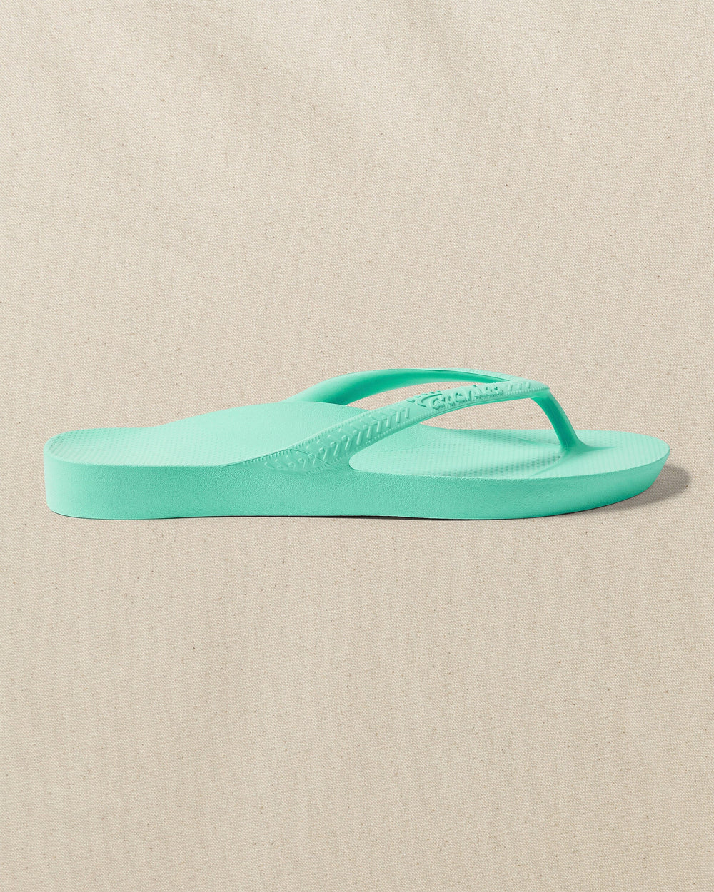 The right side view of the Southern Tide Archies Mint Arch Support Flip Flop by Southern Tide - Mint