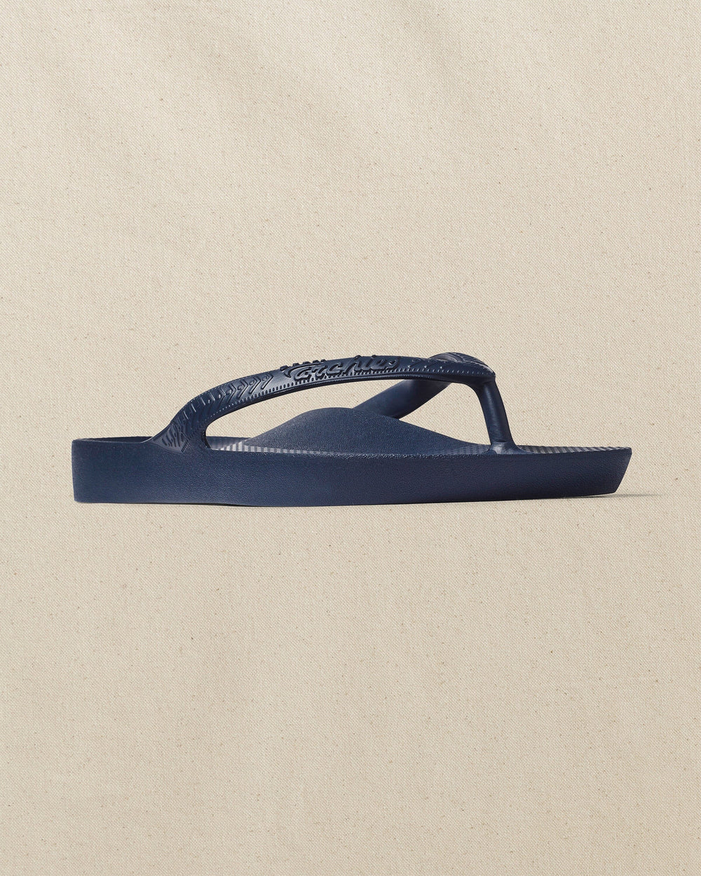 The right angle view of the Southern Tide Archie's Navy Arch Support Flip Flop by Southern Tide - Navy