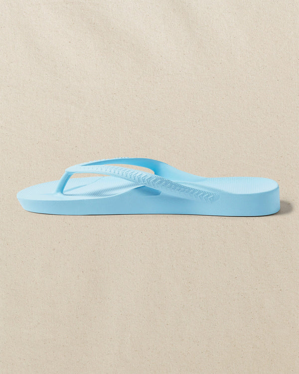 The left side view of the Southern Tide Archie's Sky Blue Arch Support Flip Flop by Southern Tide - Sky Blue