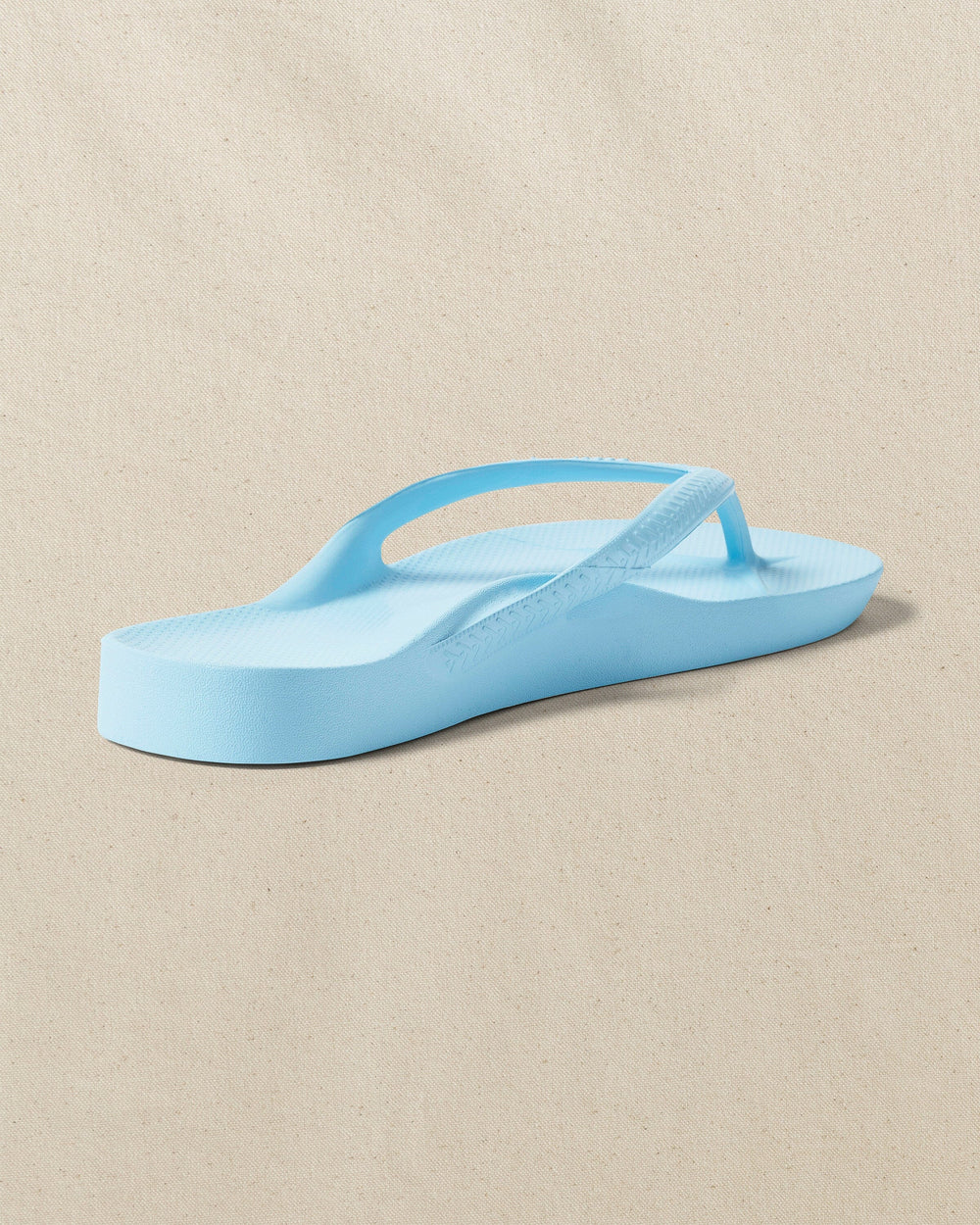 The right back view of the Southern Tide Archie's Sky Blue Arch Support Flip Flop by Southern Tide - Sky Blue