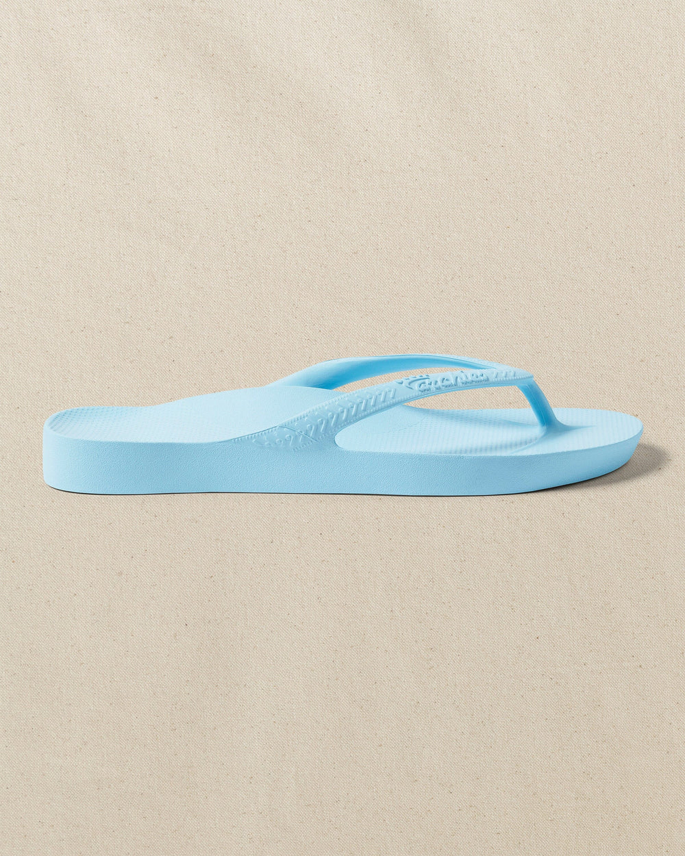 The right side view of the Southern Tide Archie's Sky Blue Arch Support Flip Flop by Southern Tide - Sky Blue