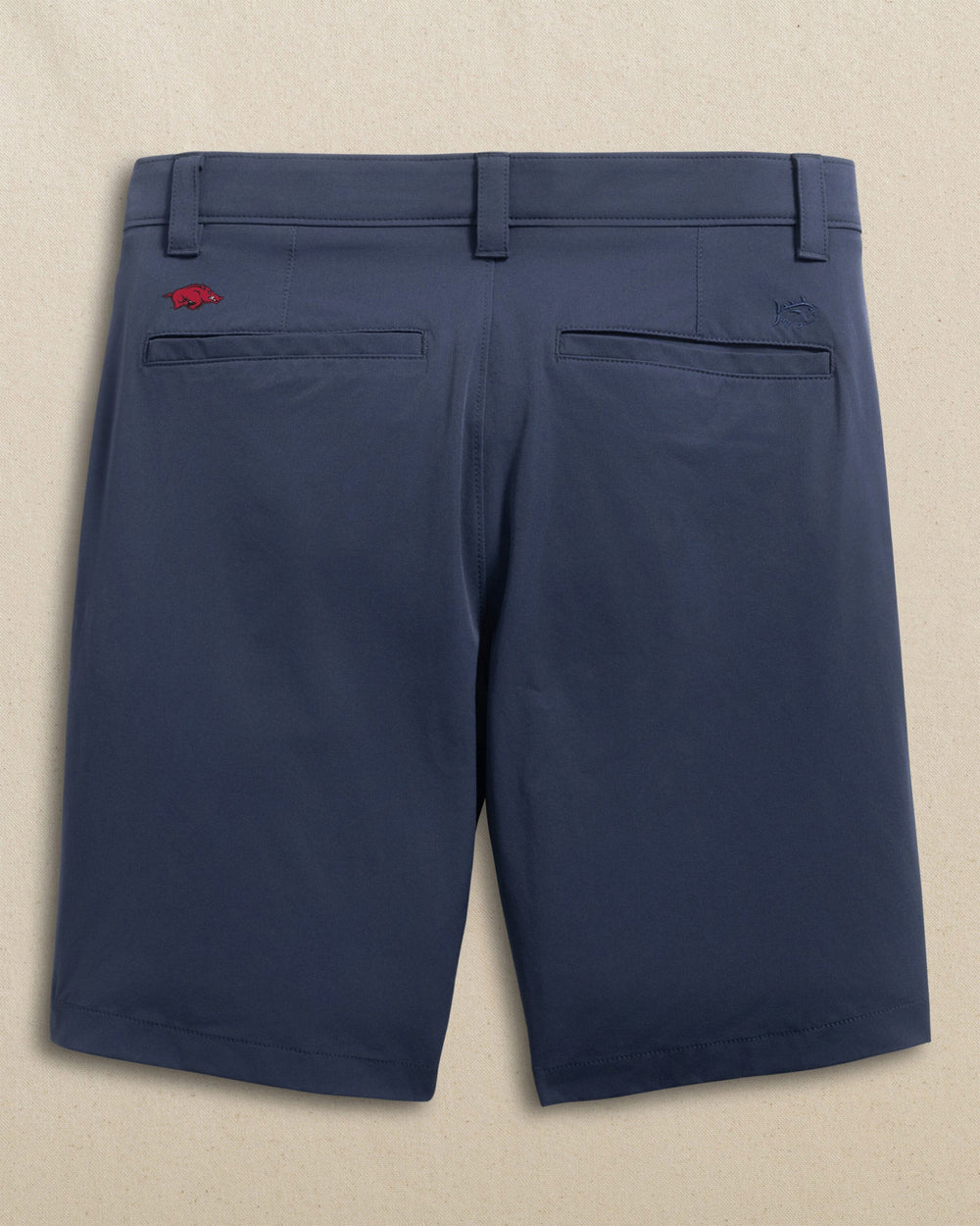 The back view of the Southern Tide Arkansas Razorbacks Birdie 8" Coastal Breeze® Performance Short by Southern Tide - True Navy