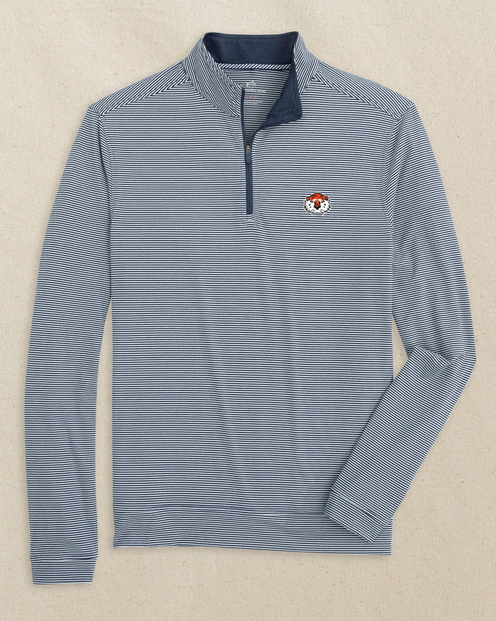 The front view of the Southern Tide Auburn Tiger Head Cruiser Micro-Stripe Heather Quarter Zip by Southern Tide - Heather Navy