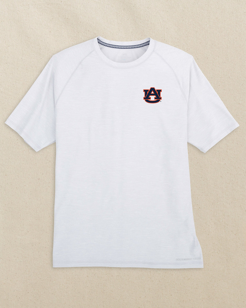 The front view of the Southern Tide Auburn Tigers brrr°®-illiant Performance T-Shirt by Southern Tide - Platinum Grey