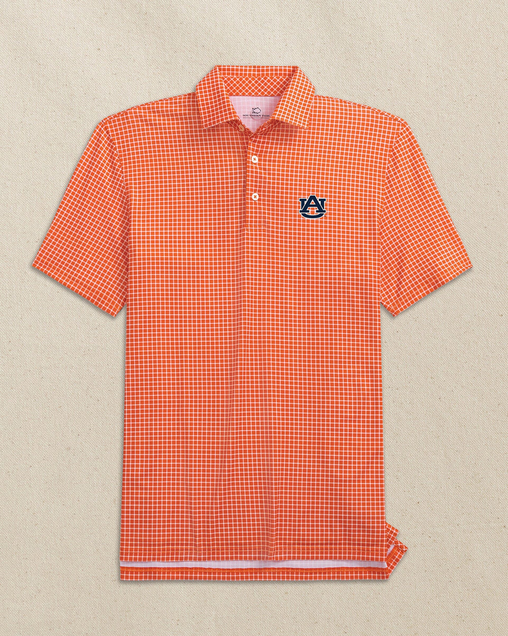 The front view of the Southern Tide Auburn Tigers Driver Dunes Edge Plaid Polo by Southern Tide - Endzone Orange