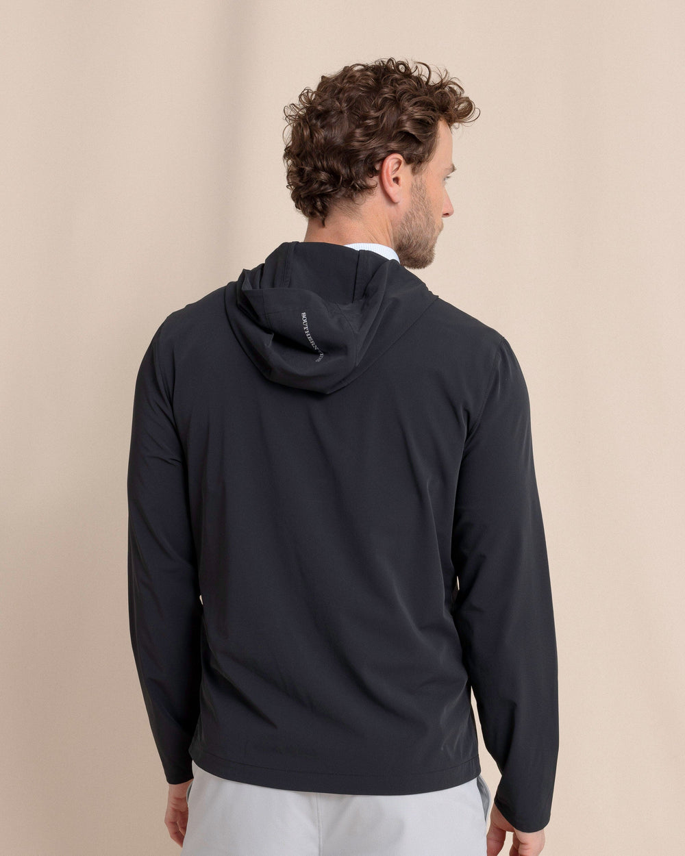 The back view of the Southern Tide Avondale Performance Jacket by Southern Tide - Caviar Black