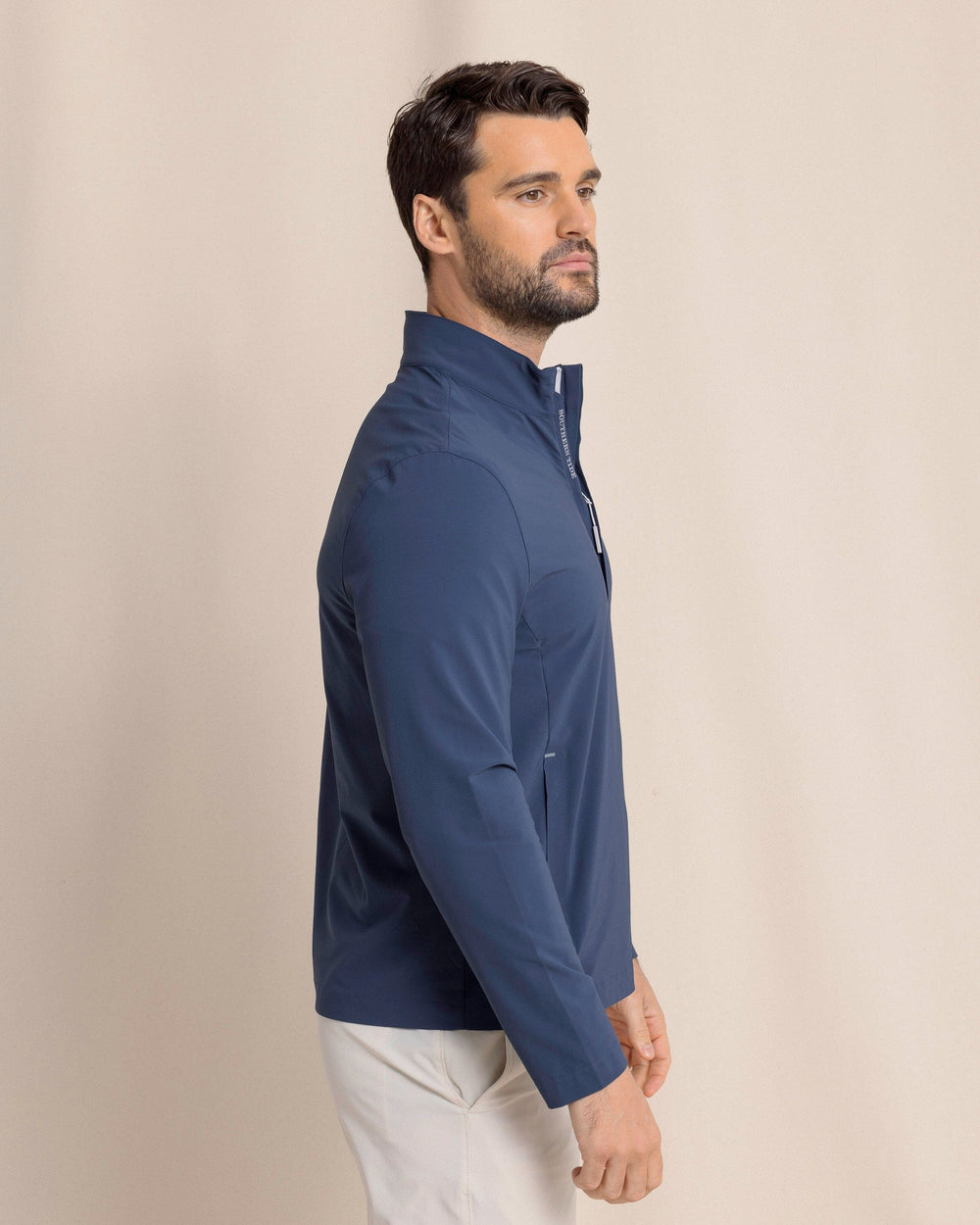 The side view of the Southern Tide Avondale Performance Jacket by Southern Tide - Dress Blue