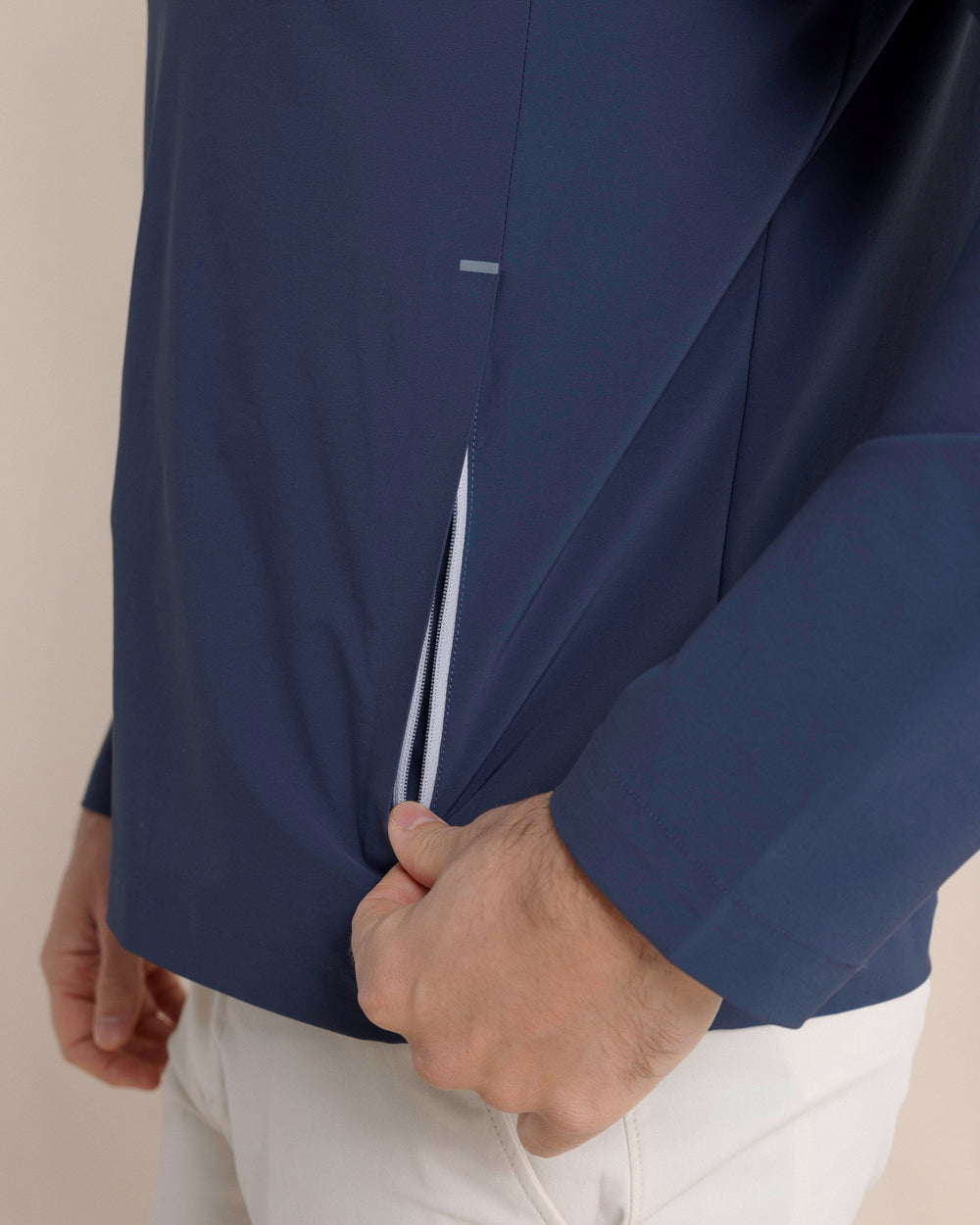 The side detail view of the Southern Tide Avondale Performance Jacket by Southern Tide - Dress Blue