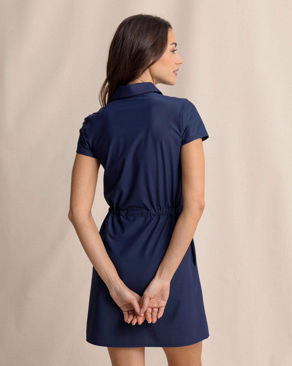 The back view of the Southern Tide Bailee Short Sleeve Performance Dress by Southern Tide - Dress Blue