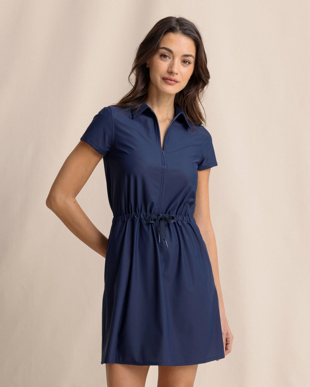 The front side view of the Southern Tide Bailee Short Sleeve Performance Dress by Southern Tide - Dress Blue