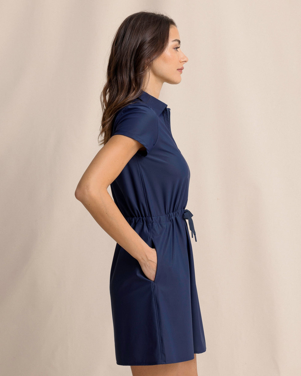 The side view of the Southern Tide Bailee Short Sleeve Performance Dress by Southern Tide - Dress Blue