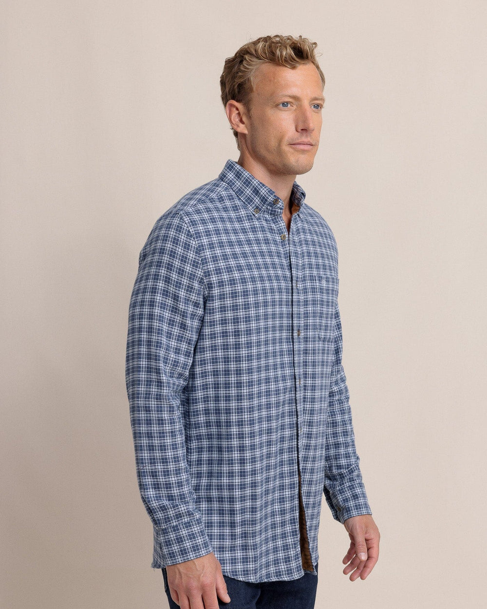 The side view of the Southern Tide Barnwell Plaid Long Sleeve Sport Shirt by Southern Tide - Triumph Blue