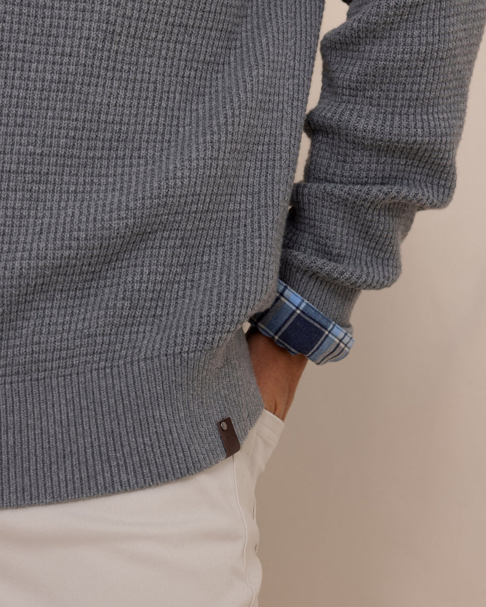 The detail view of the Southern Tide Bass Creek Heather Quarter Button Sweater by Southern Tide - Heather Anchor Grey