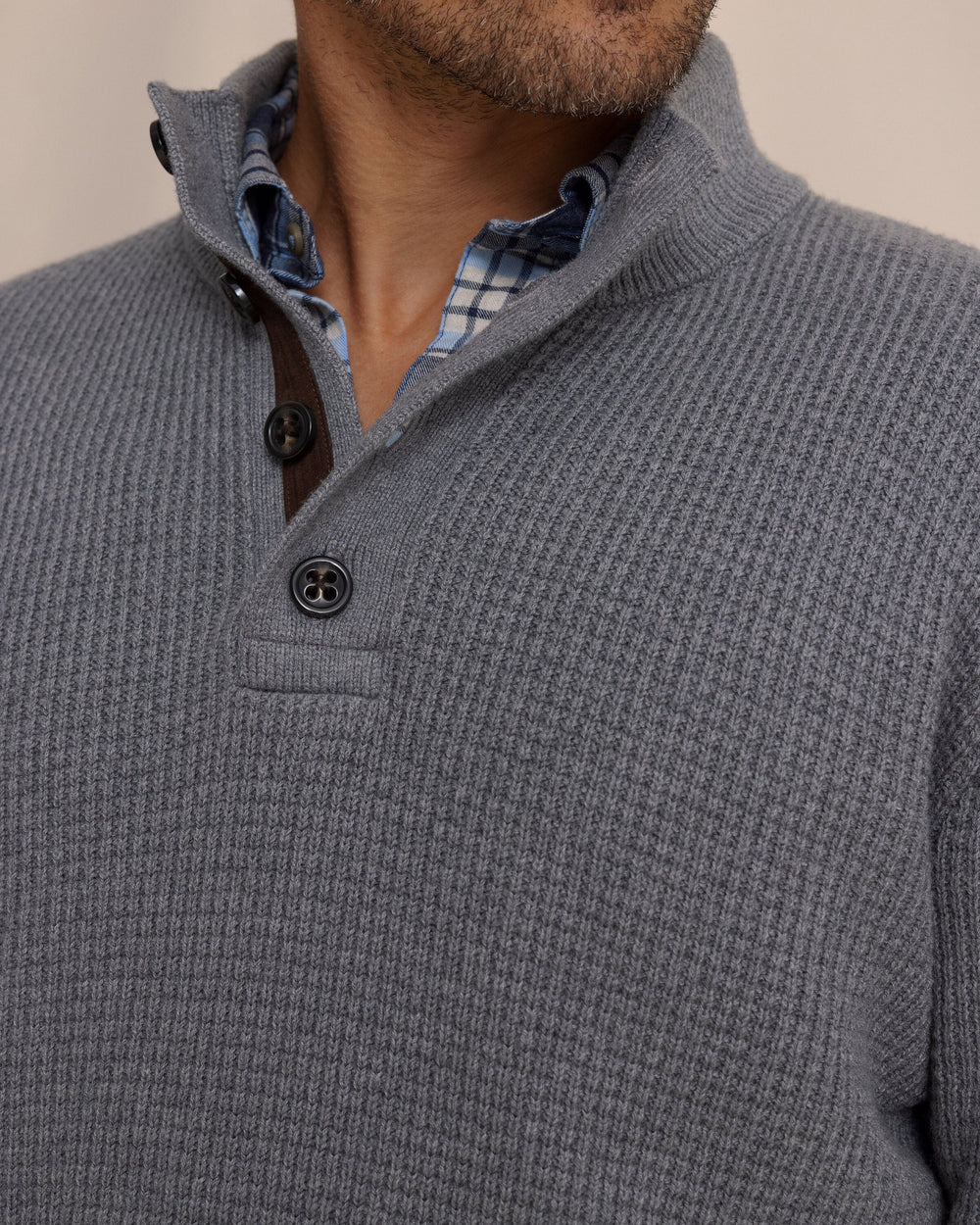 The detail view of the Southern Tide Bass Creek Heather Quarter Button Sweater by Southern Tide - Heather Anchor Grey