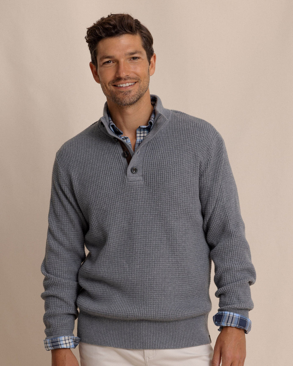 The front view of the Southern Tide Bass Creek Heather Quarter Button Sweater by Southern Tide - Heather Anchor Grey