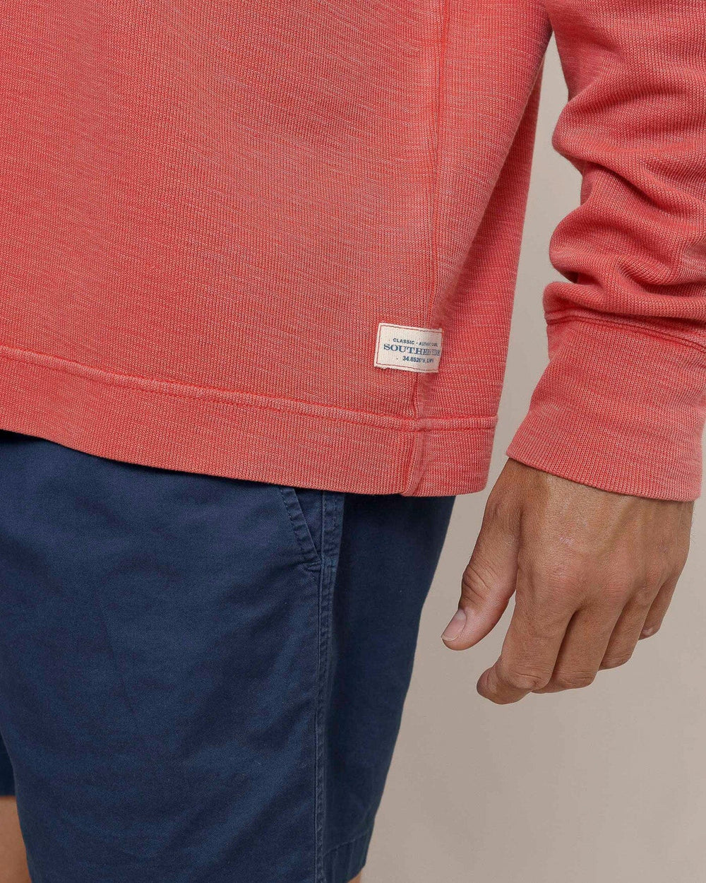 The detail view of the Southern Tide Bar Berry Quarter Zip by Southern Tide - Mineral Red