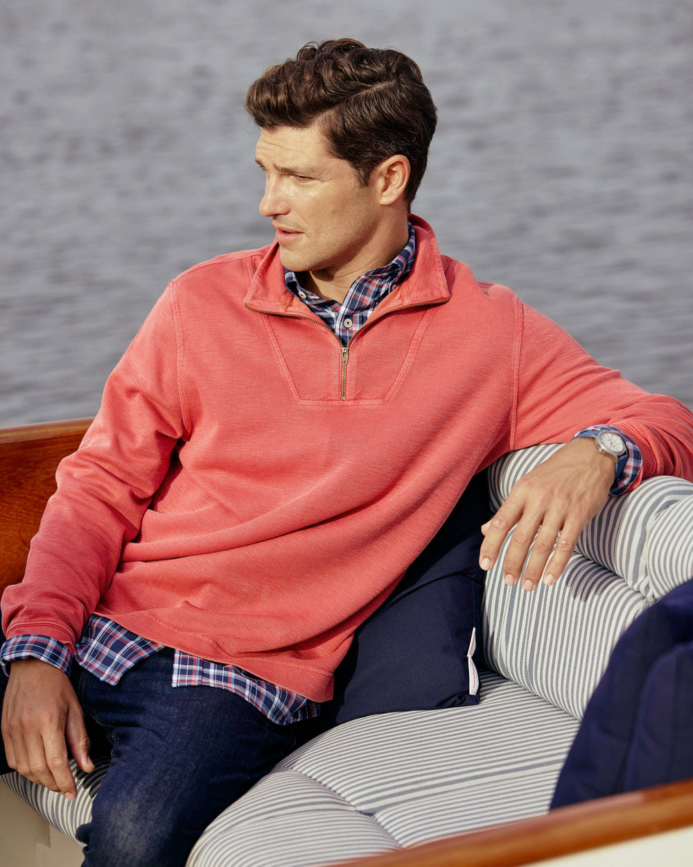 The lifestyle view of the Southern Tide Bar Berry Quarter Zip by Southern Tide - Mineral Red