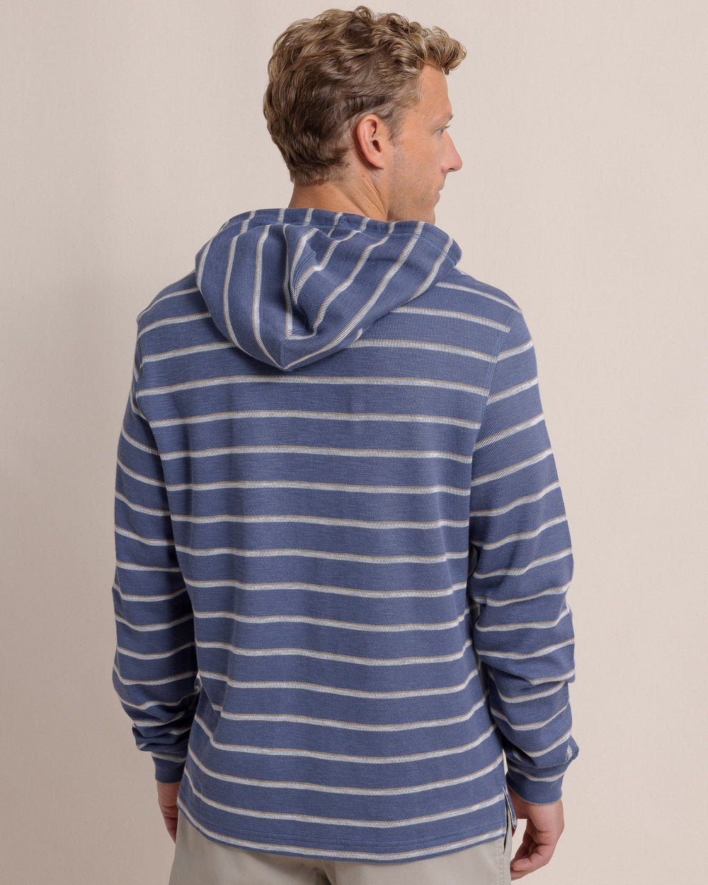 The back view of the Southern Tide Bay View Stripe Hoodie by Southern Tide - Light Indigo