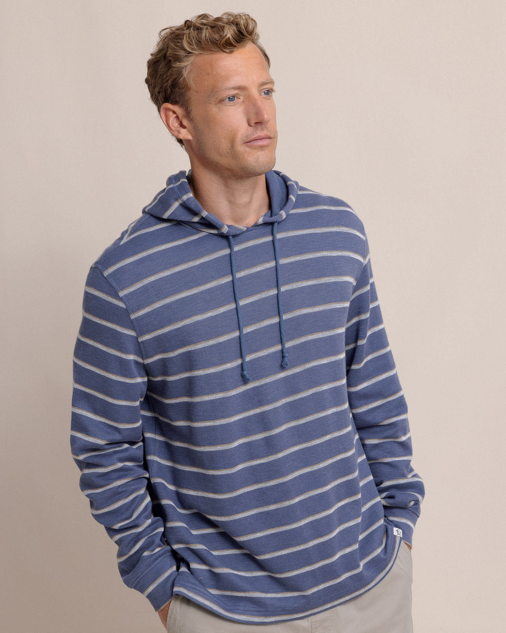 The side view of the Southern Tide Bay View Stripe Hoodie by Southern Tide - Light Indigo