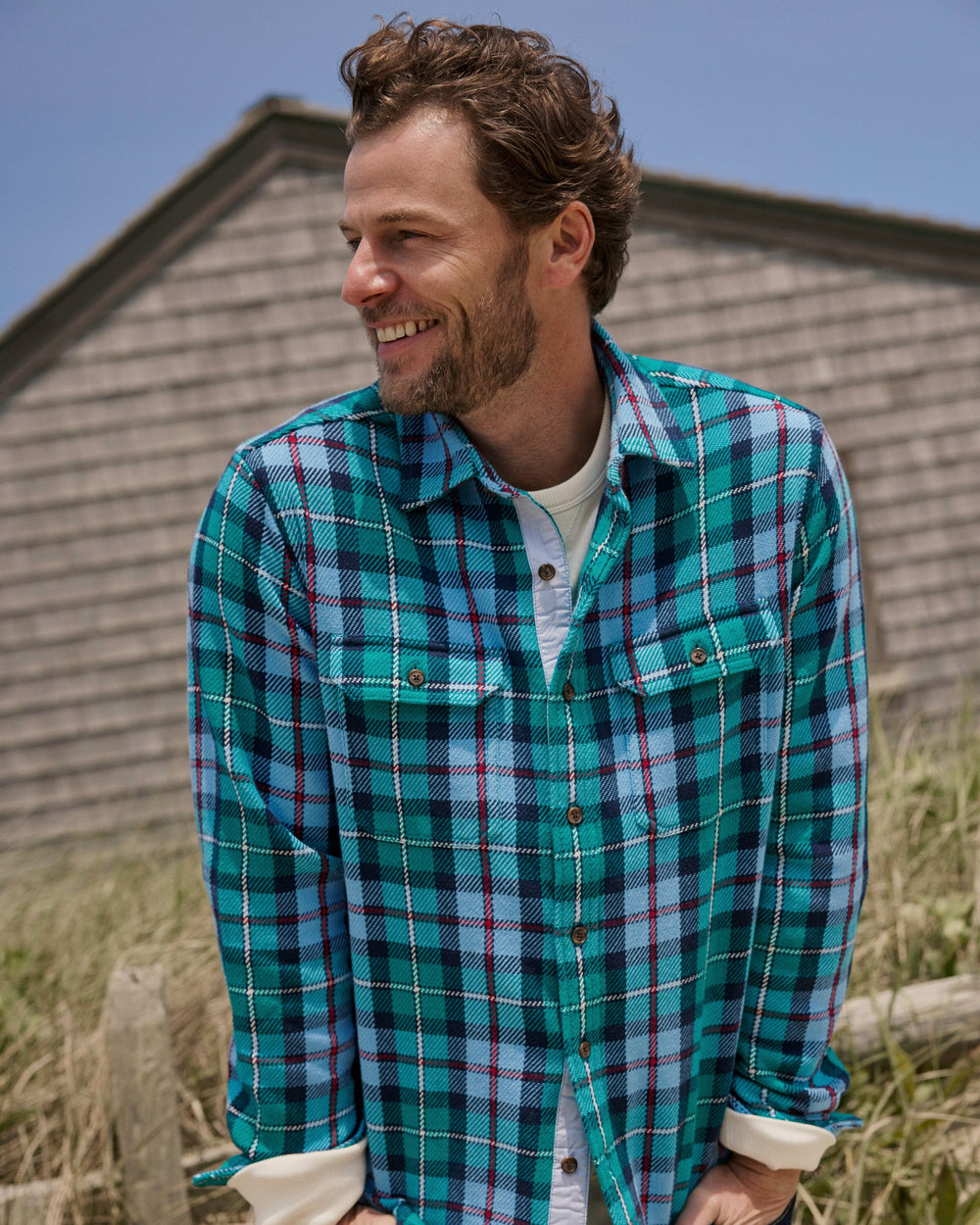 The lifestyle view of the Southern Tide Beach Bluff Plaid Twill Shirt by Southern Tide - Spruce Shade