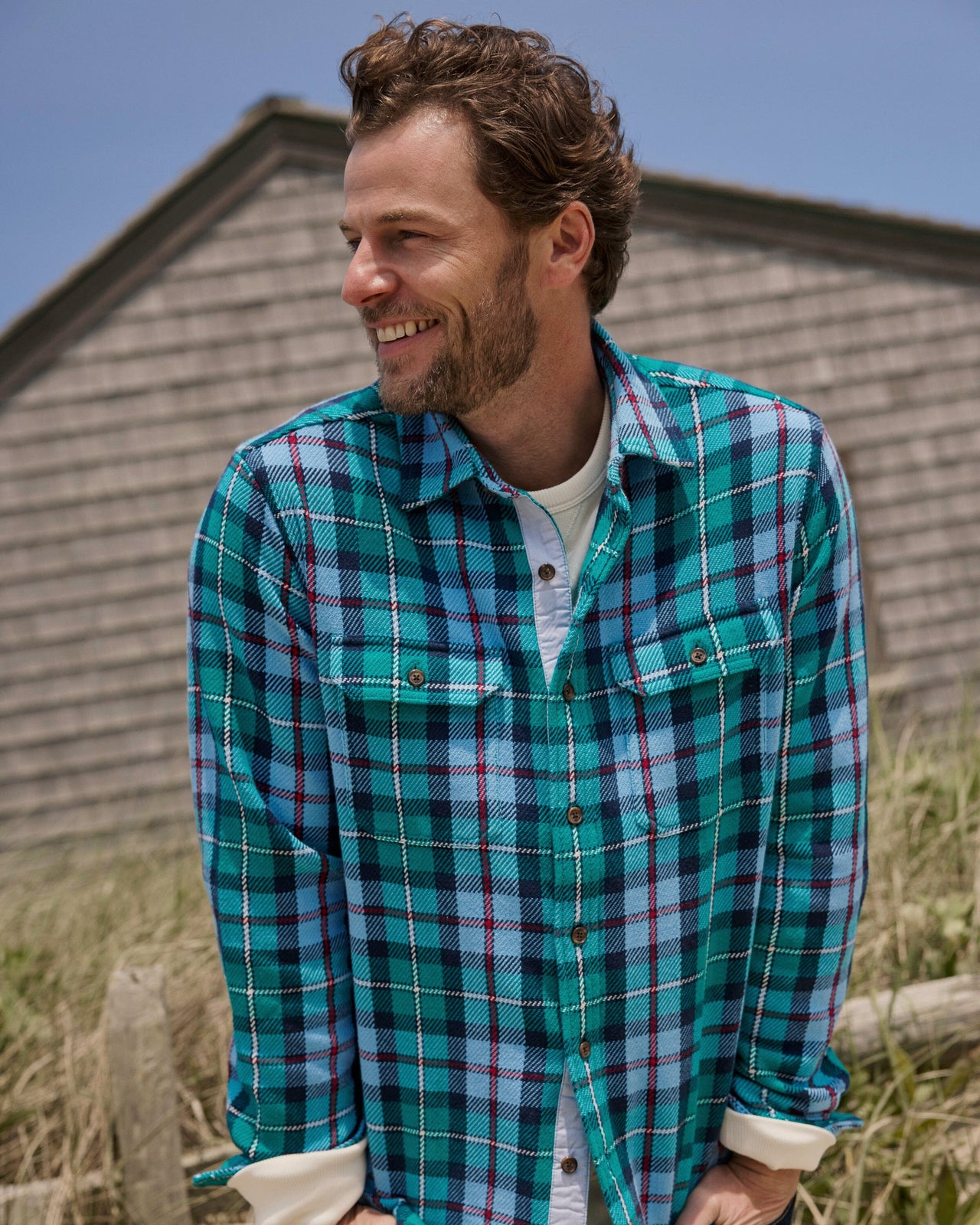 The lifestyle view of the Southern Tide Beach Bluff Plaid Twill Shirt by Southern Tide - Spruce Shade