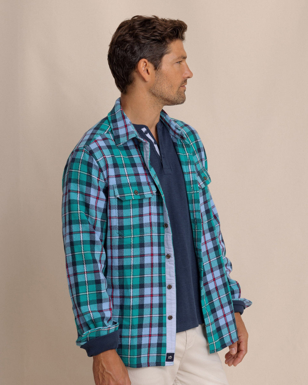 The side view of the Southern Tide Beach Bluff Plaid Twill Shirt by Southern Tide - Spruce Shade