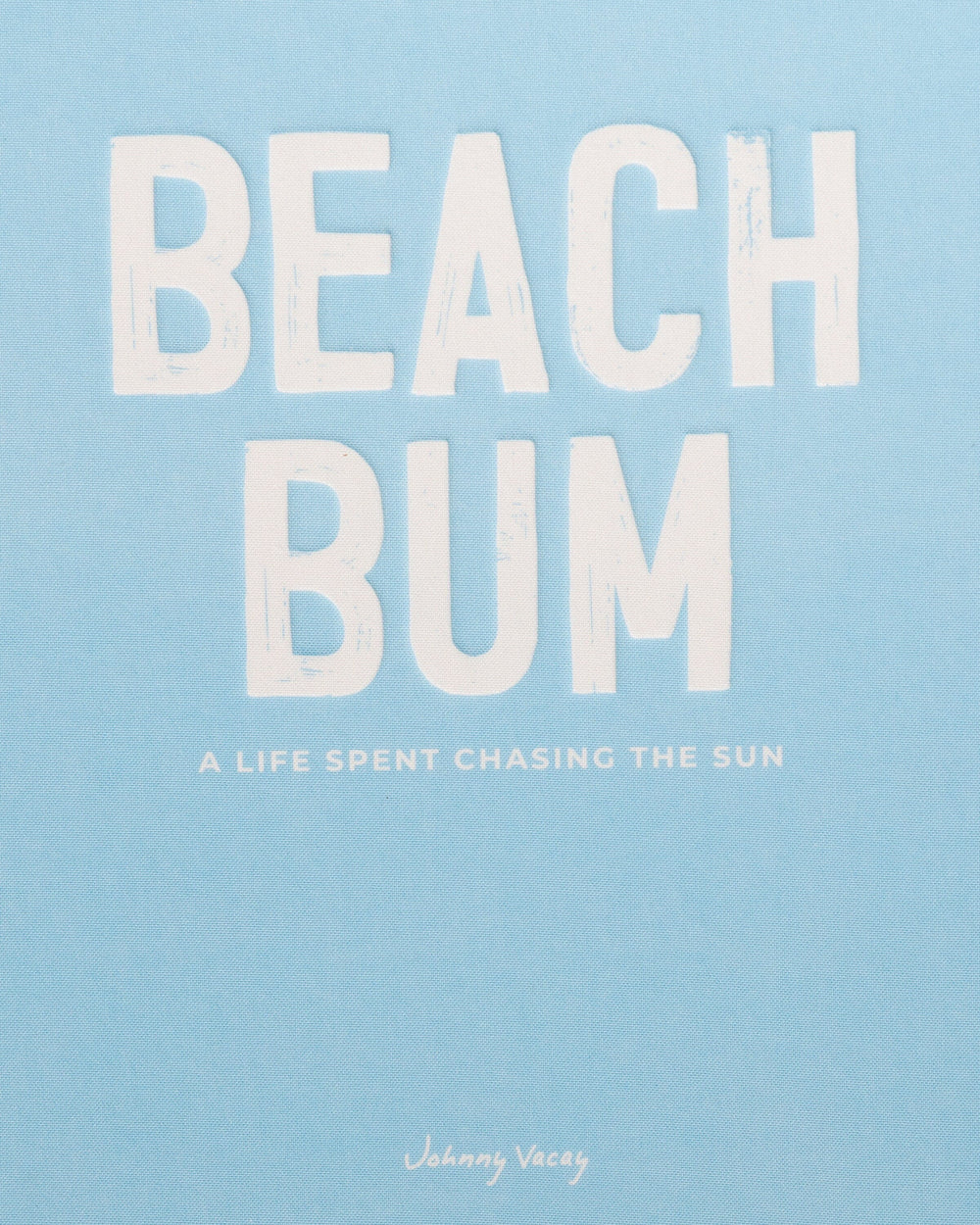 The detail view of the Johnny Vacay Beach Bum Book at Southern Tide - White