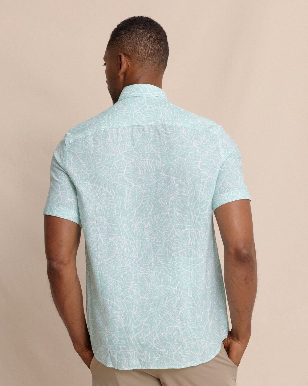 The back view of the Southern Tide Beach Palms Linen Rayon Short Sleeve Sport Shirt by Southern Tide - Garden Grove