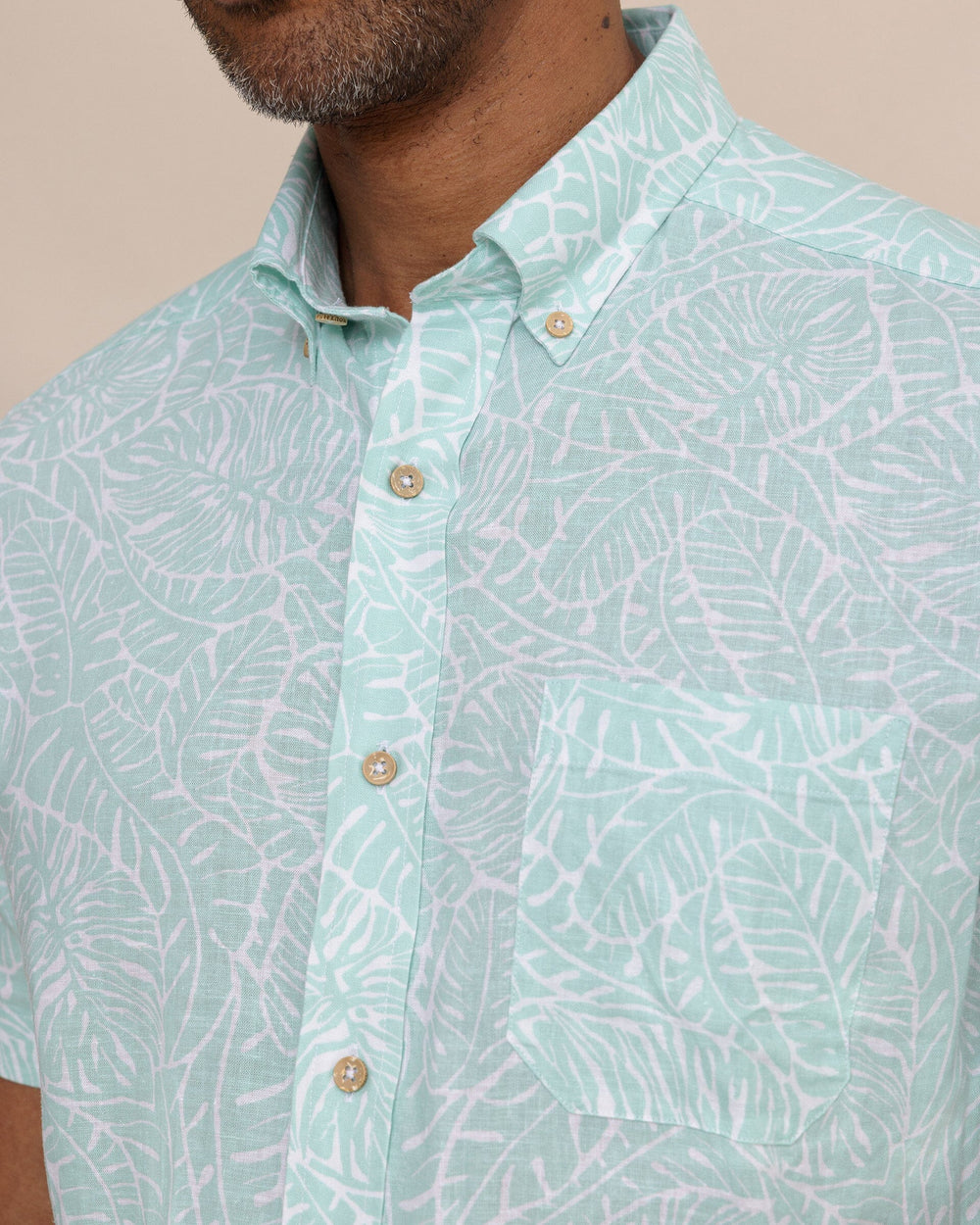 The detail view of the Southern Tide Beach Palms Linen Rayon Short Sleeve Sport Shirt by Southern Tide - Garden Grove