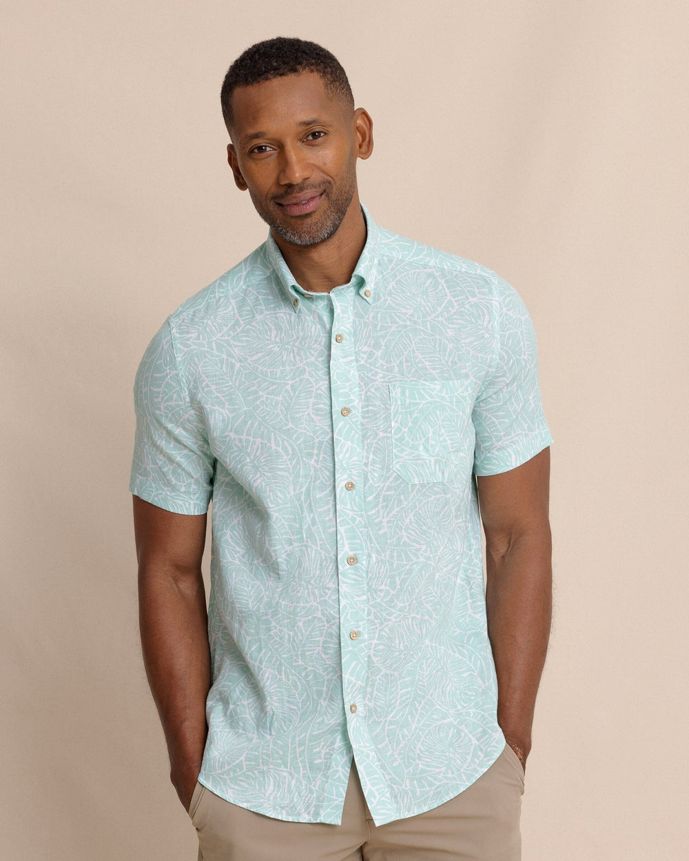 The front view of the Southern Tide Beach Palms Linen Rayon Short Sleeve Sport Shirt by Southern Tide - Garden Grove