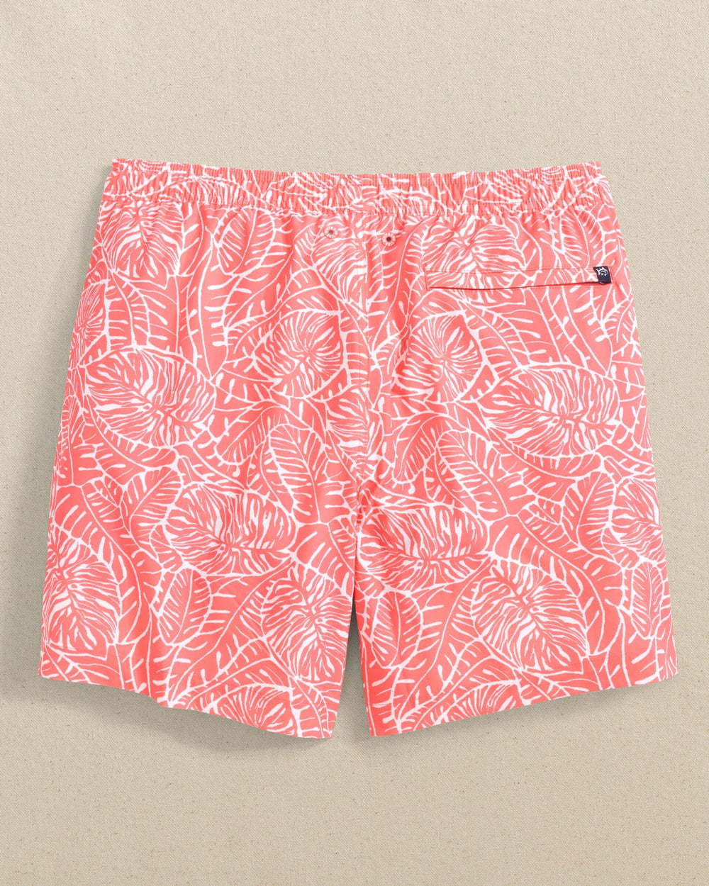 The back view of the Southern Tide Beach Palms Swim Trunk by Southern Tide - Sunkist Coral