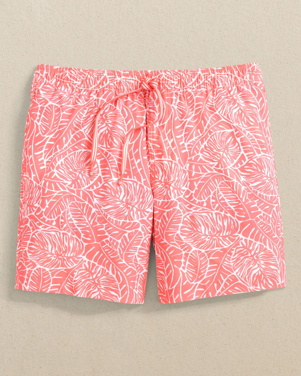 The front view of the Southern Tide Beach Palms Swim Trunk by Southern Tide - Sunkist Coral